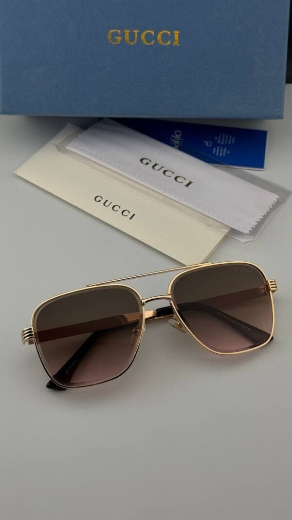 عینک آفتابی گوچی GUCCI | طراحی خلبانی کلاسیک با فریم طلایی و عدسی رنگی