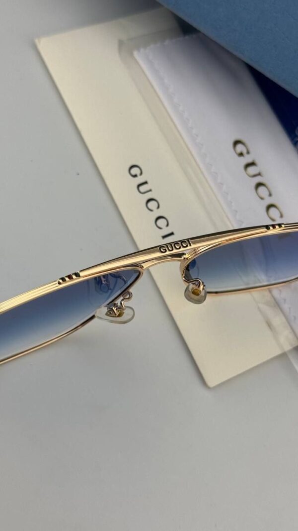 عینک آفتابی گوچی GUCCI | طراحی خلبانی کلاسیک با فریم طلایی و عدسی رنگی