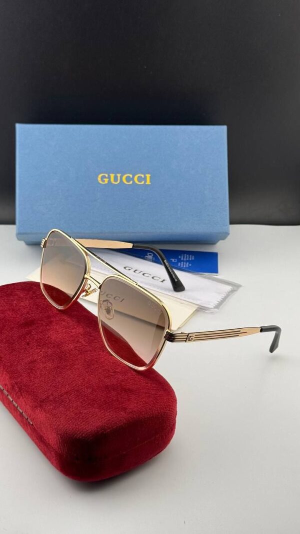 عینک آفتابی گوچی GUCCI | طراحی خلبانی کلاسیک با فریم طلایی و عدسی رنگی